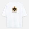 THE CREST TEE — LUXORIQ PHOENIX in white, back view with the LUXORIQ crest, wordmark and IN EVERY THREAD