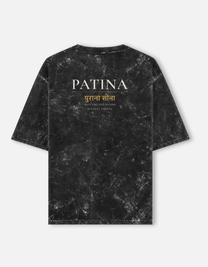 PATINA — Acid Wash Oversized Tee in black, back view with PATINA and the Hindi words purana sona across the upper back