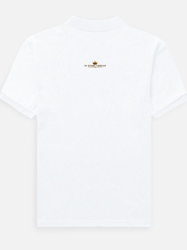 LUXORIQ Crest Polo in white, back view with IN EVERY THREAD embroidered at the nape