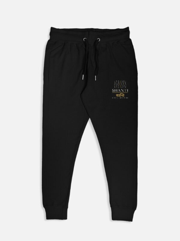 SHANTI — Mindful Movement Joggers in black, left-leg print of wave lines, SHANTI and शान्ति