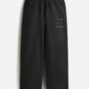 mausam-sweatpants-black MAUSAM — Sweatpants in black, four weather glyphs on the left thigh