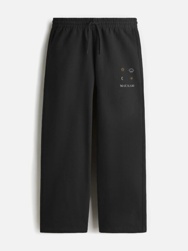mausam-sweatpants-black MAUSAM — Sweatpants in black, four weather glyphs on the left thigh
