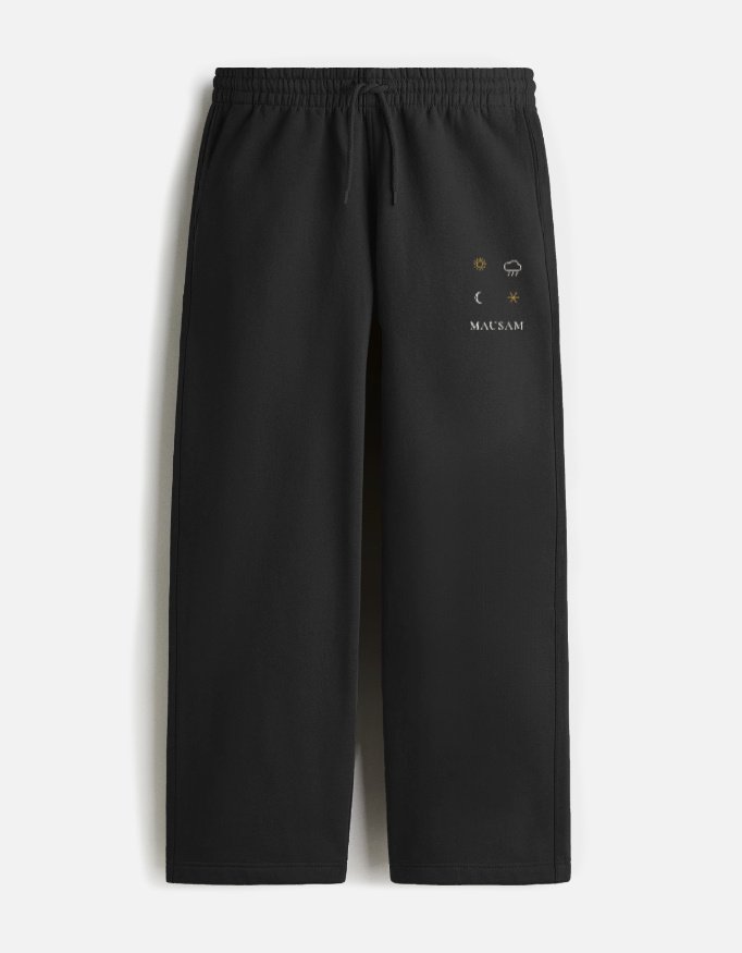 mausam-sweatpants-black MAUSAM — Sweatpants in black, four weather glyphs on the left thigh