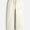 mausam-sweatpants-off-white MAUSAM — Sweatpants in off white, four weather glyphs on the left thigh