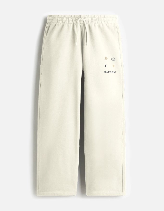 mausam-sweatpants-off-white MAUSAM — Sweatpants in off white, four weather glyphs on the left thigh