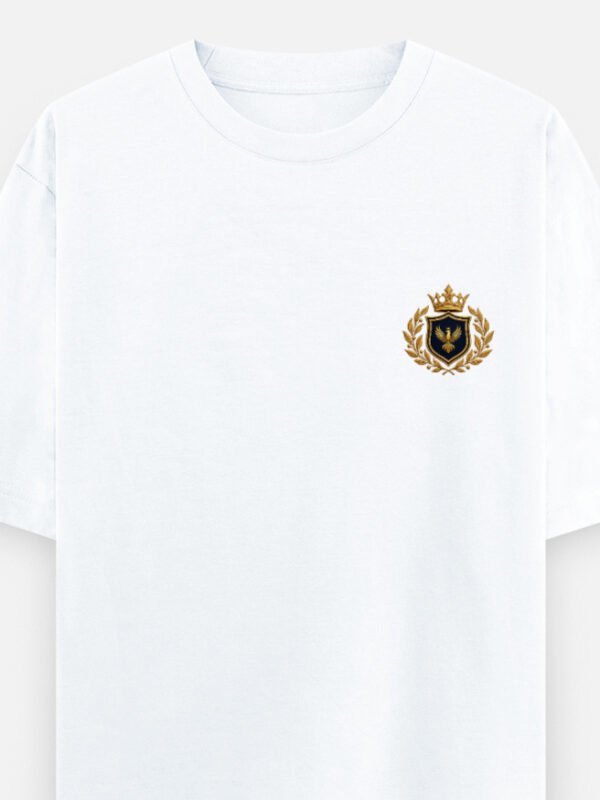 the-crest-tee-phoenix-front THE CREST TEE — LUXORIQ PHOENIX in white, front view with the phoenix crest at the left chest