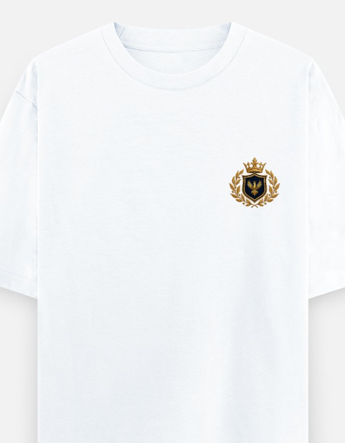 THE CREST TEE — LUXORIQ PHOENIX in white, front view with the phoenix crest at the left chest