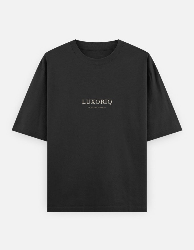THE HOUSE TEE — INK in black, front view with the small chest print