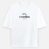 The House Tee in white, front view with the small chest print